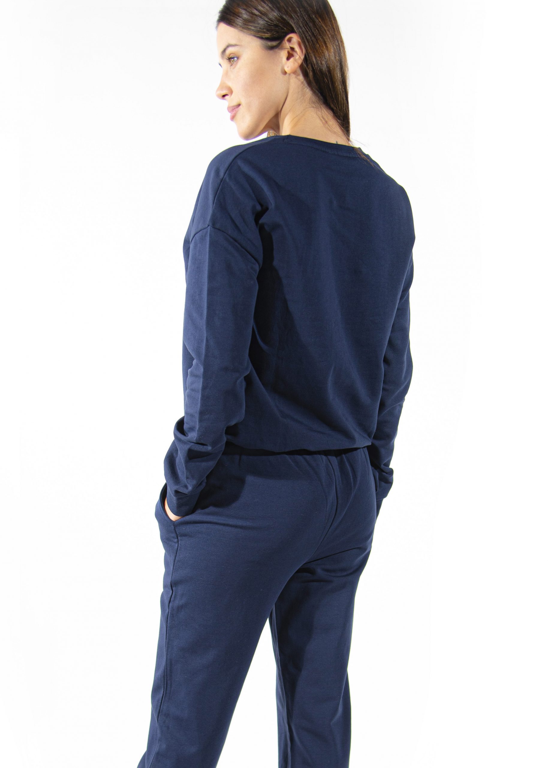 tuta femminile da dietro di colore blu