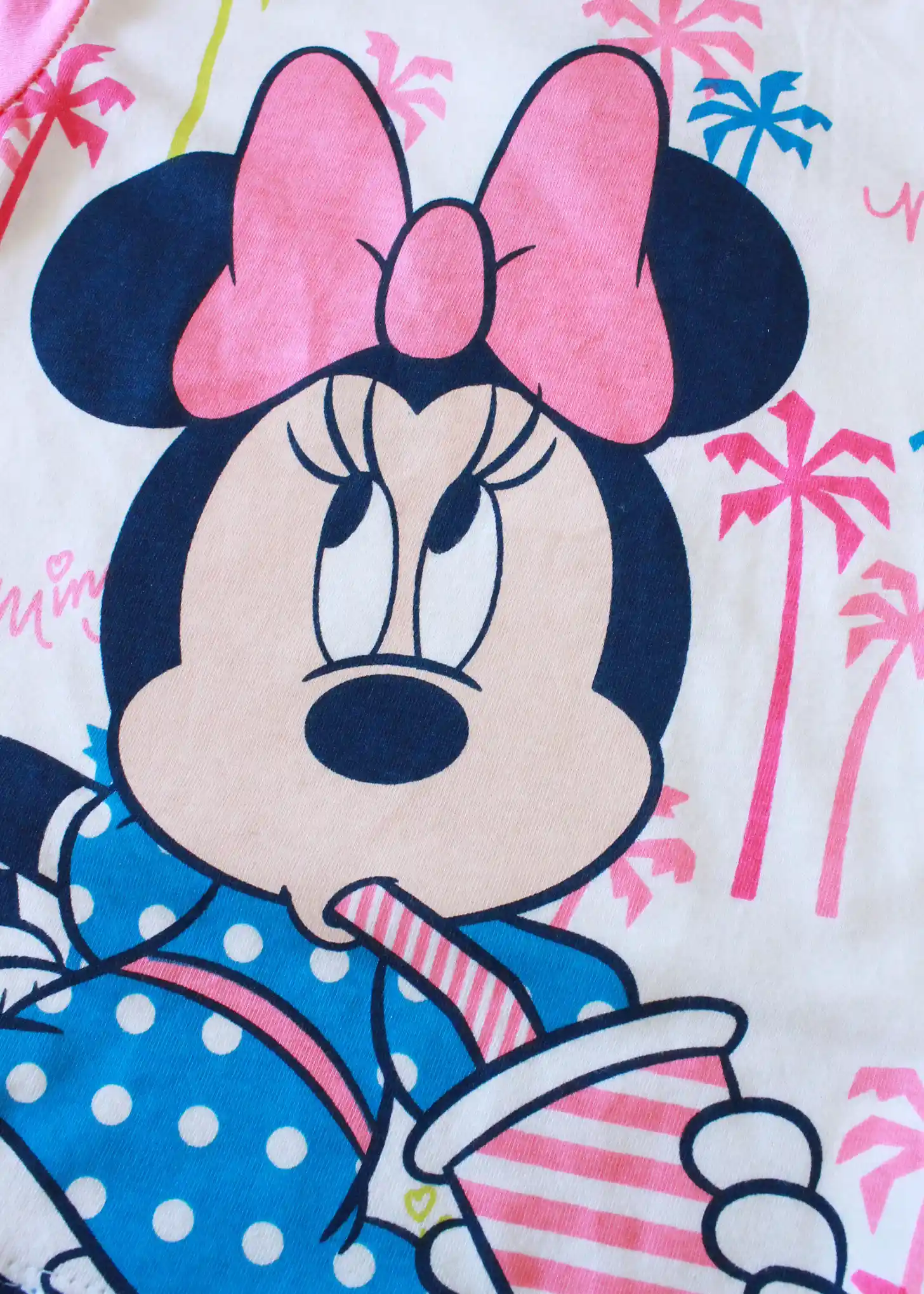 pigiama di minnie di colore rosa